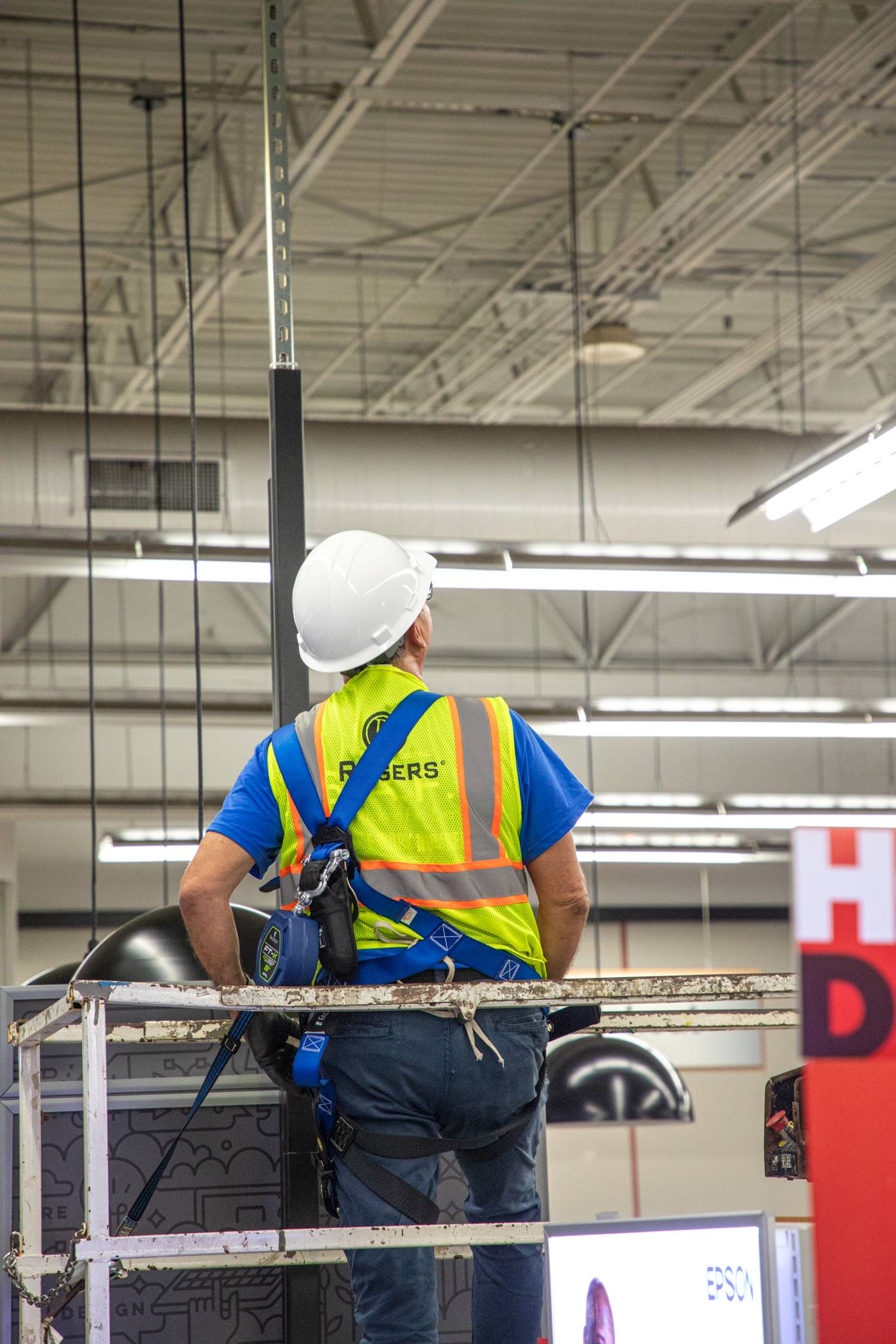 Technician on lift.