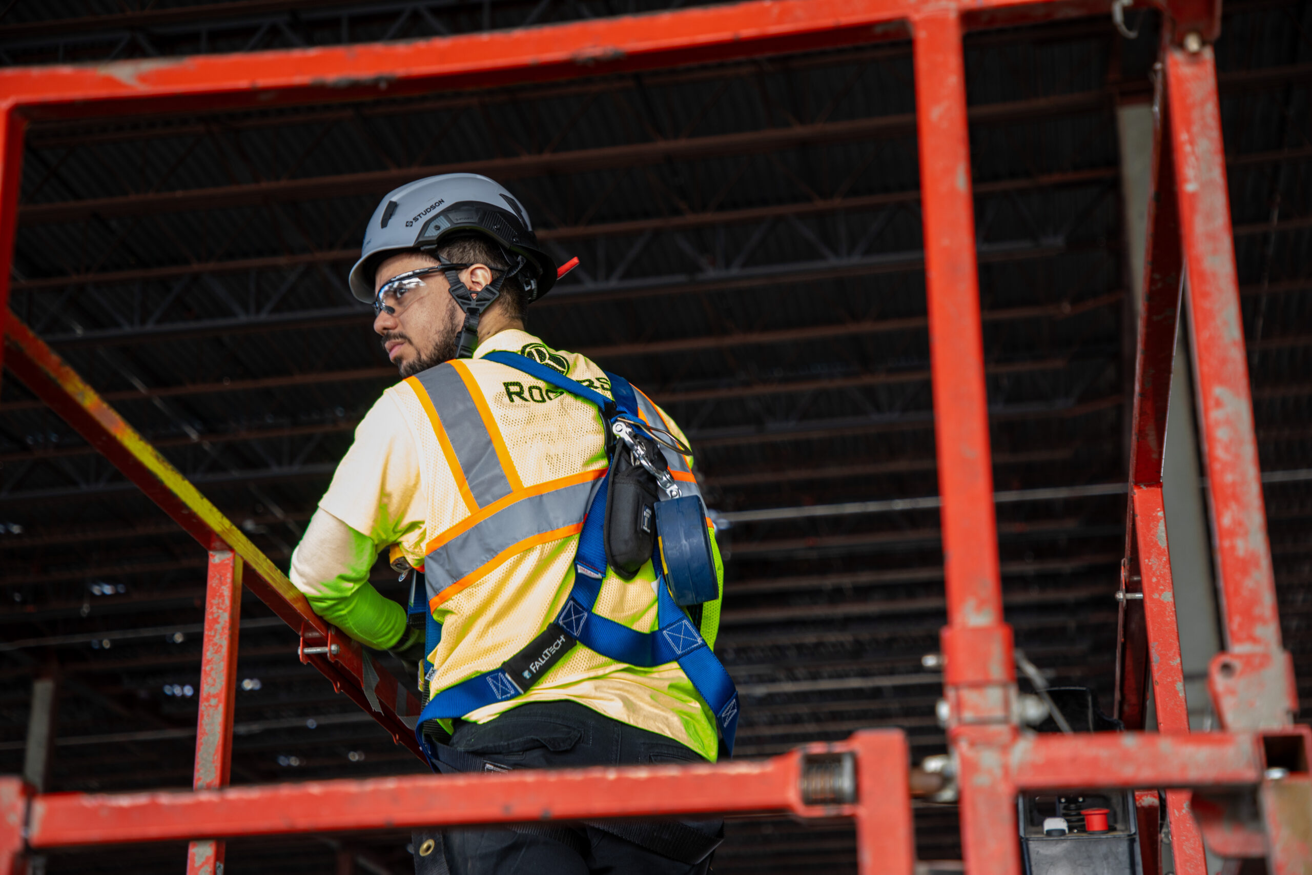 electrician working on scissor lift