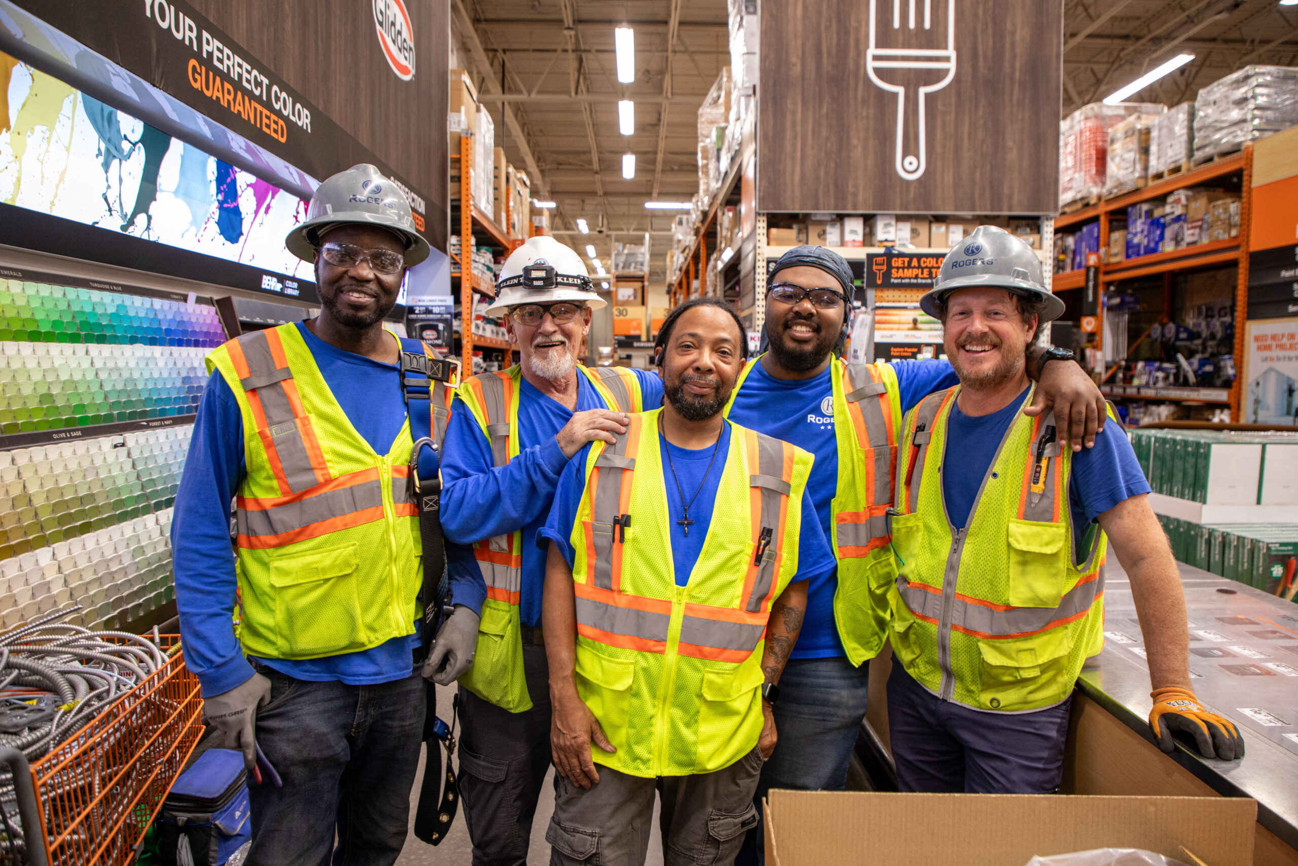 electrician coworkers smiling for photo