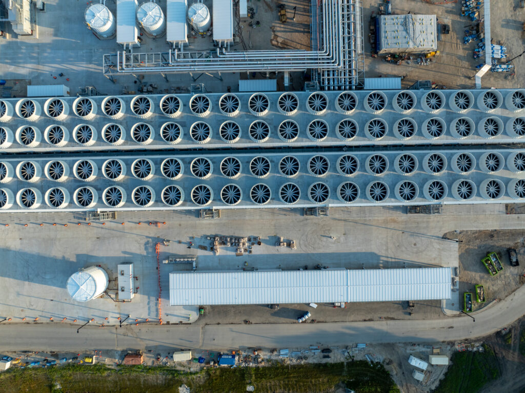 Aerial view of large-scale data center cooling infrastructure and mechanical systems supporting high-density computing environments.