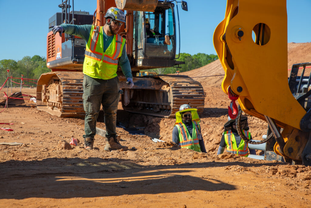 Electricians working on site to meet modern building code requirements