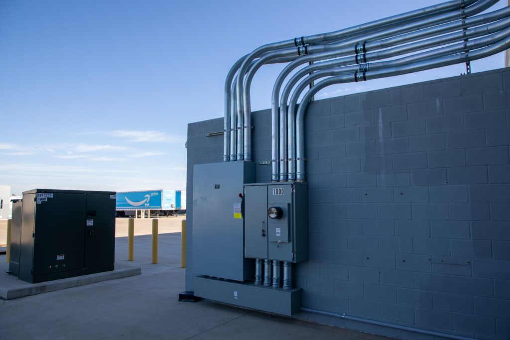 Commercial electrical service equipment and conduit installation designed to improve power reliability and support resilient infrastructure during extreme weather events.